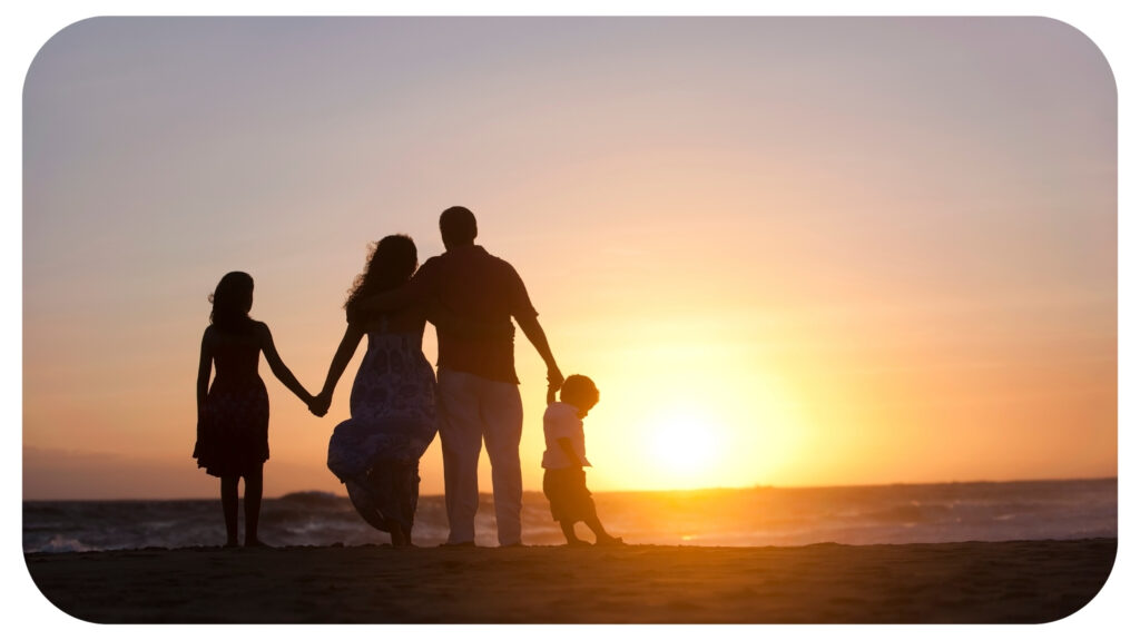 Family watching the sunset.