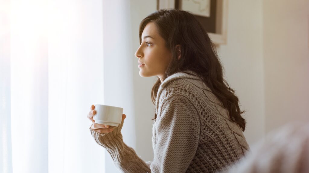 woman thinking at home.