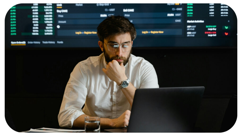 Techie analysing on laptop.