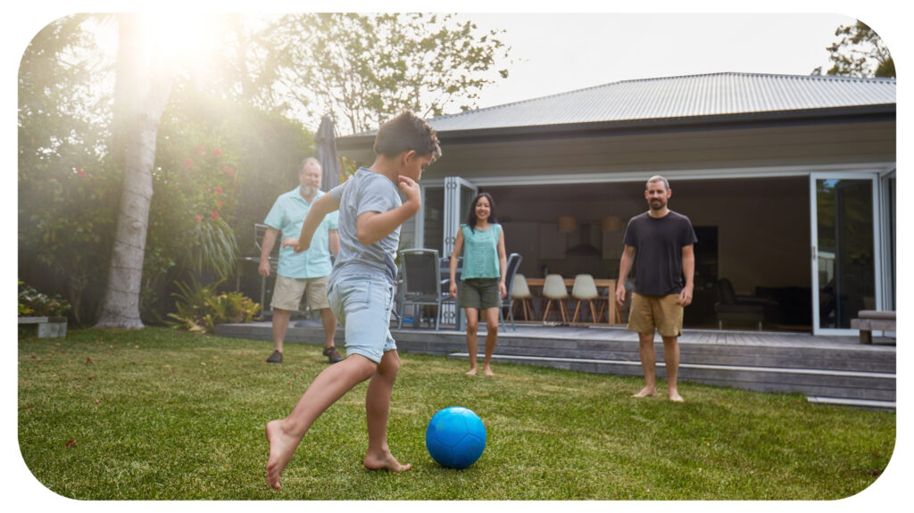 family playing in the back yard garden.