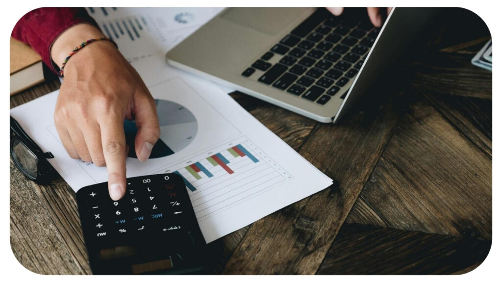 Close up view of bookkeeper or financial inspector hands making report.